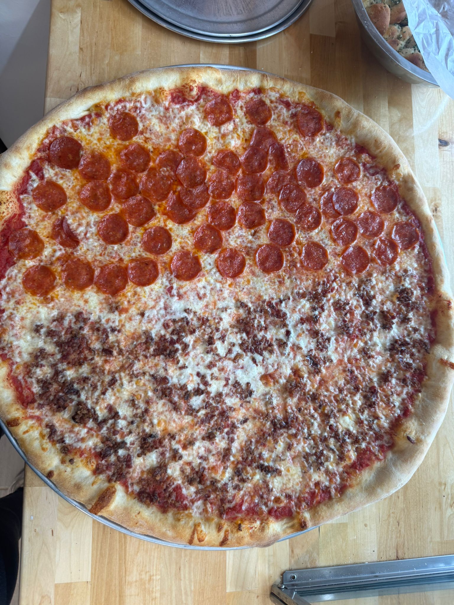 Fresh pizza being prepared at Fazzino's